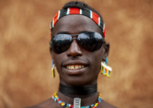 Fashionable tsemay tribe man with sunglasses, Omo Valley, Key Afer, Ethiopia