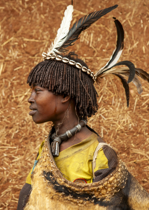 Portrait of bana woman with feathers, Omo valley, Key Afer, Ethiopia