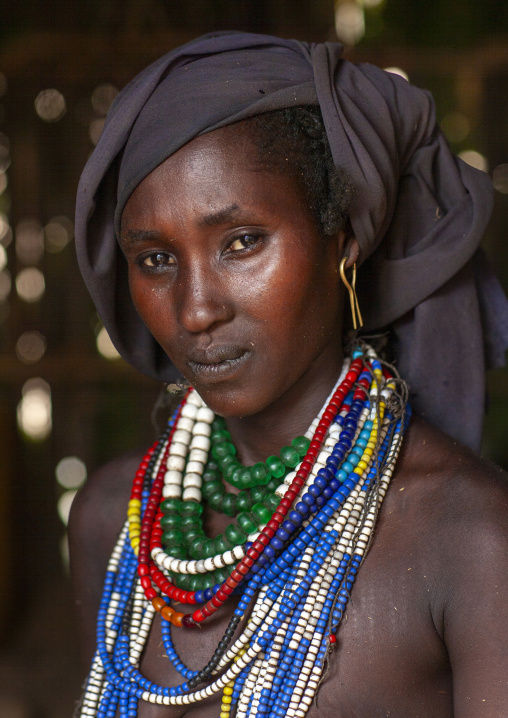 Portrait of erbore tribe woman wearing beaded necklace, Omo Valley, Yabello, Ethiopia