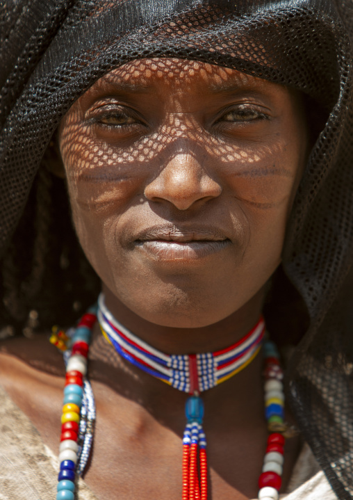 Portrait of a Karrayyu tribe woman with facial scarifications, Oromia, Metehara, Ethiopia