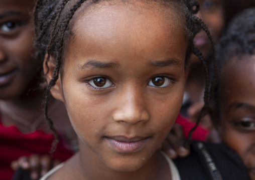 Portrait of a girl surrended by children, South West Region, Tepi, Ethiopia