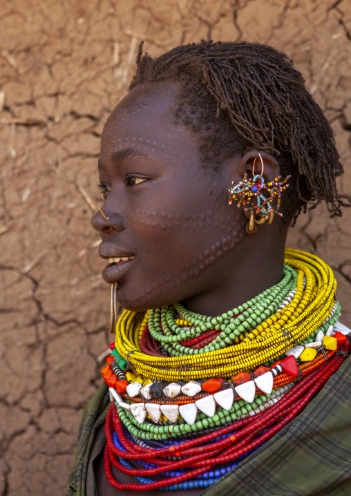 Portrait of a topossa woman, with traditional clothes, Omo valley, Kangate, Ethiopia