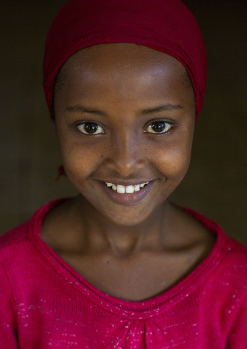 Portrait of a muslim smiling girl, Sheka zone, Tepi, Ethiopia