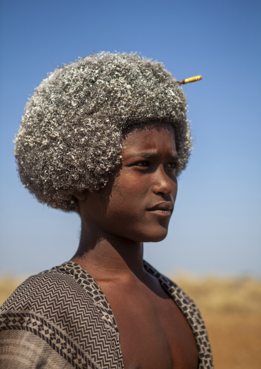Portrait of an Afar tribe man with butter in the hair, Afar Region, Mille, Ethiopia