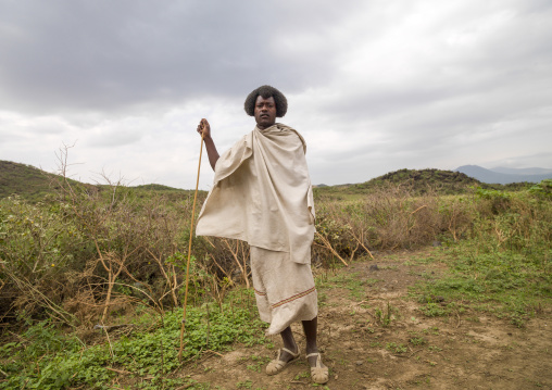 Portrait of a Karrayyu man with traditional hairstyle, Oromia, Metahara, Ethiopia