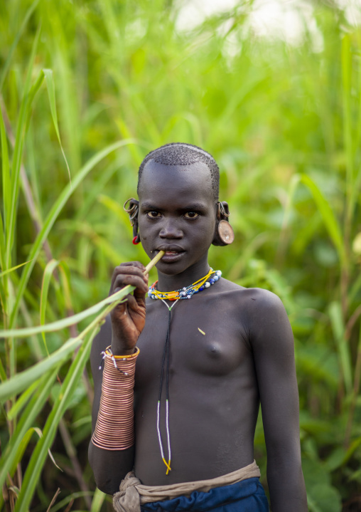 Surma girl with enlarged ears, Omo valley, Kibish, Ethiopia