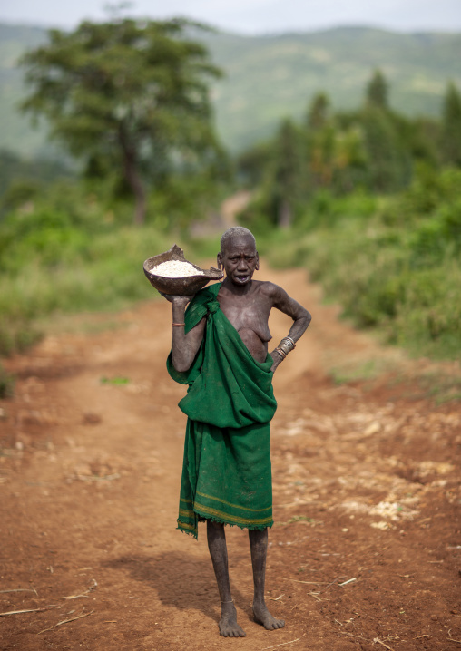 Old surma woman with a stretched lip, Kibish, Omo valley, Ethiopia