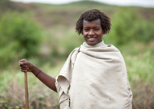 Portrait of a Karrayyu man with traditional hairstyle, Oromia, Metahara, Ethiopia