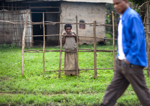 Woman looking at a man passing by, South West Region, Mizan Teferi, Ethiopia