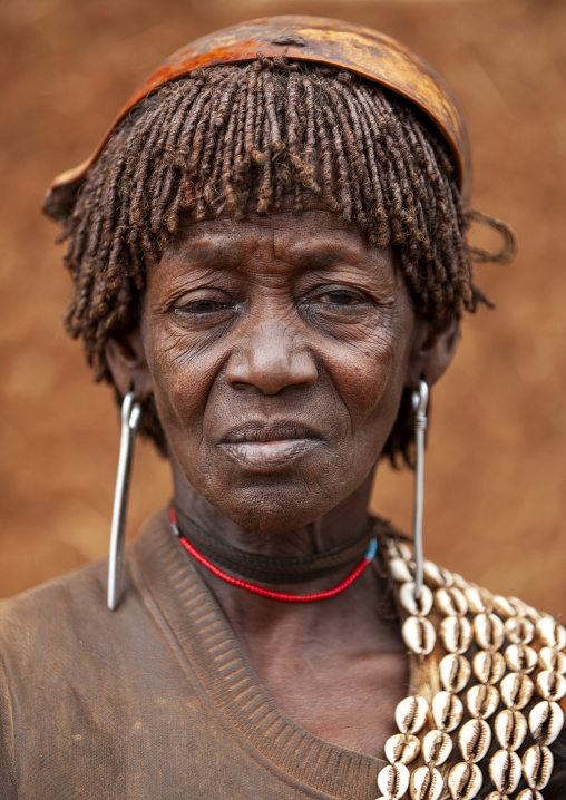 Banna tribe woman with calabash on the gead, Key afer, Omo valley, Ethiopia