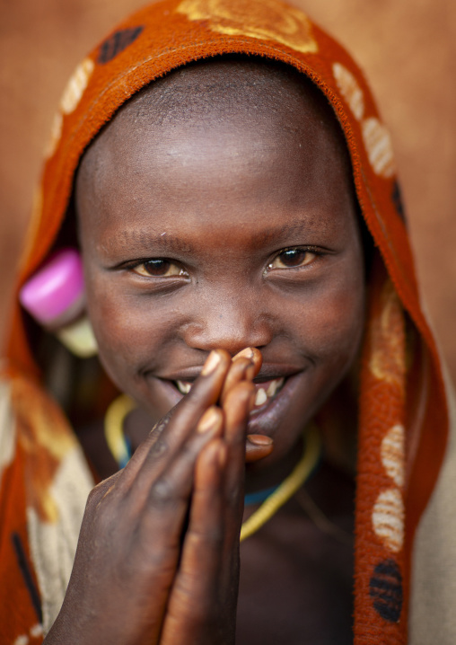 Suri tribe girl with enlarged earlobe, Kibish, Omo valley, Ethiopia