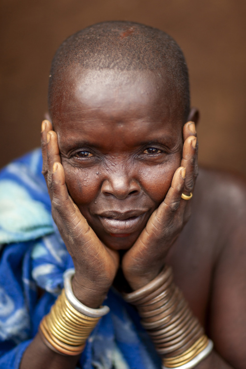 Bodi tribe old woman with bracelets, Hana Mursi, Omo valley, Ethiopia