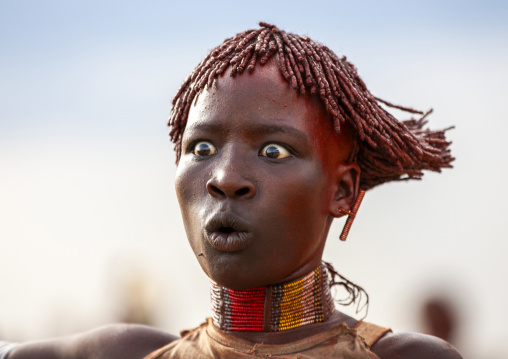 Portrait of a Hamer tribe woman during bull jumping, Turmi, Omo valley, Ethiopia