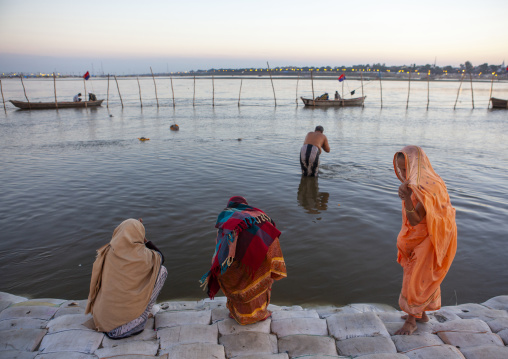 Pilgrims bathing in ganges during Maha kumbh mela, Uttar Pradesh, Allahabad, India