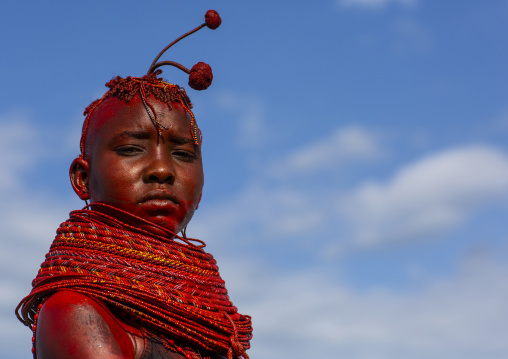 Turkana tribe woman with huge necklaces and ear rings, Turkana lake, Loiyangalani, Kenya