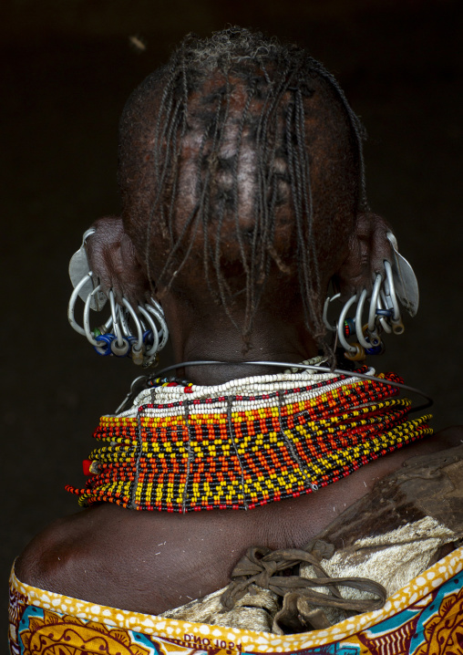 Turkana tribe woman with huge necklaces and earrings, Turkana lake, Loiyangalani, Kenya