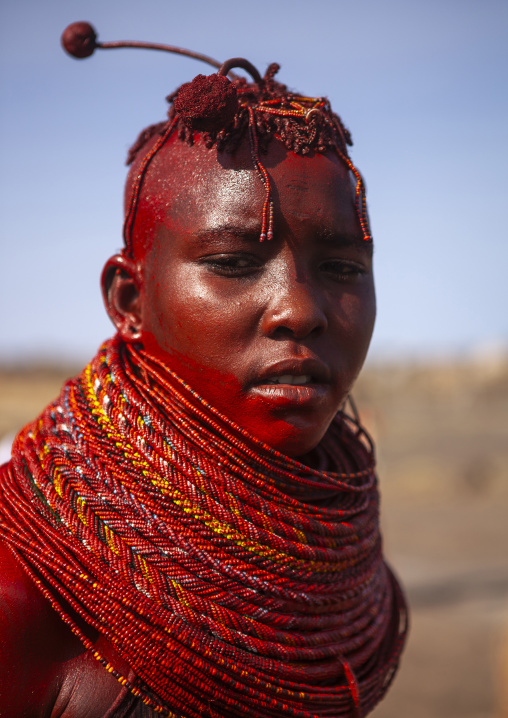 Turkana tribe woman with huge necklaces and ear rings, Turkana lake, Loiyangalani, Kenya