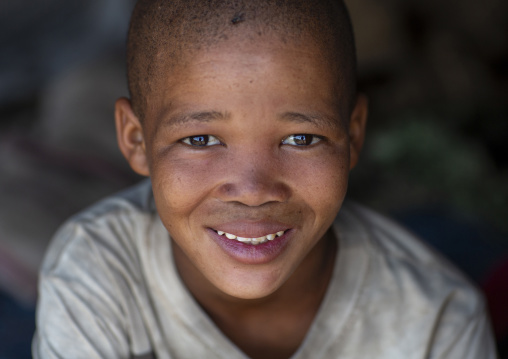 Portrait of a bushman tribe child boy, Otjozondjupa, Tsumkwe, Namibia