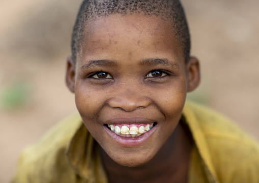 Portrait of a bushman tribe child boy, Otjozondjupa, Tsumkwe, Namibia