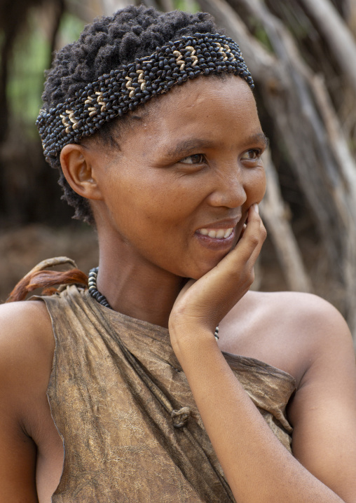 Bushman woman with beaded traditional headdress, Otjozondjupa, Tsumkwe, Namibia