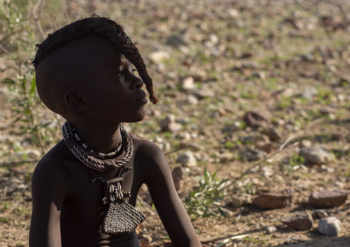 Young Himba twin girl with traditional hairstyle, Kunene region, Epupa, Namibia