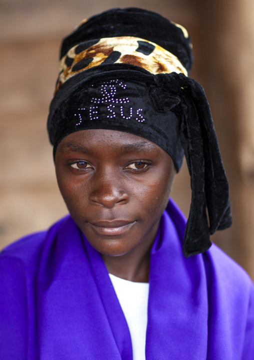 Batwa tribe woman with a jesus headwear, Western province, Cyamudongo, Rwanda