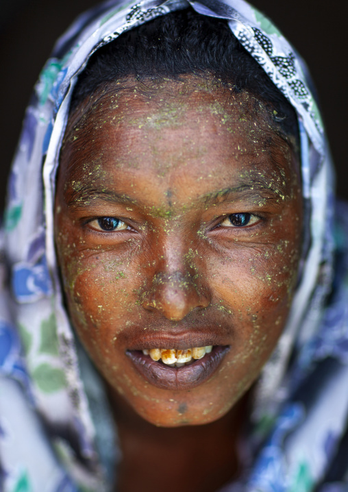 Portrait of a smiling woman with quasil on her face, Maroodi Jeh region, Hargeisa, Somaliland