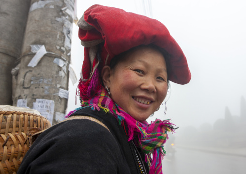 Smiling red dzao woman with traditional headgear, Lao Cai province, Sapa, Vietnam