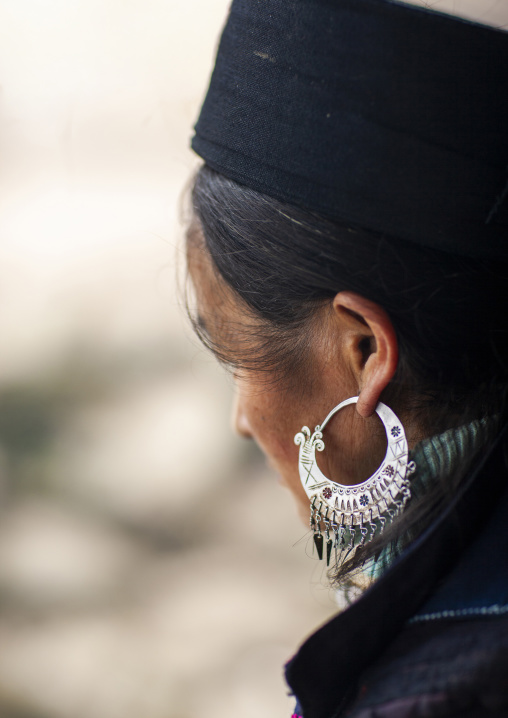 Black Hmong woman with traditional silver earrings, Lao Cai province, Sapa, Vietnam