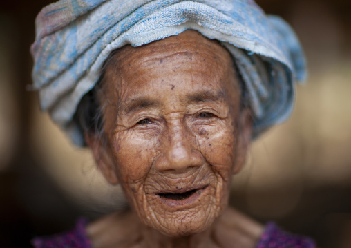 Lao lum tribe old woman portrait, Mekong river, Pakbeng, Laos