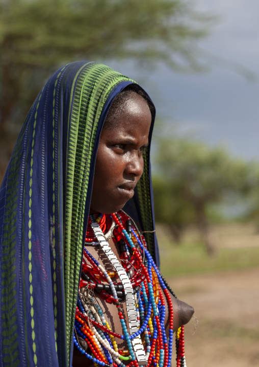 Arbore tribe teenage girl with beaded necklaces, Omo Valley, Yabello, Ethiopia