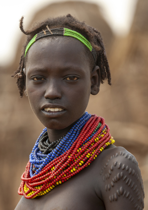 Dassanech tribe woman with necklaces, Omo valley, Omorate, Omo valley, Ethiopia