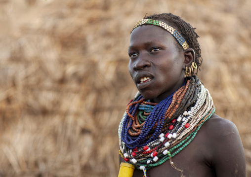 Nyangatom senior tribe woman with necklaces, Omo valley, Murile, Ethiopia