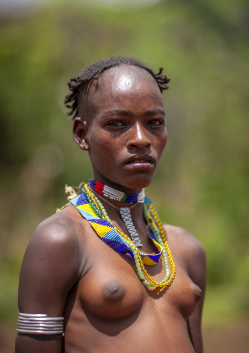 Portrait of a Ari tribe topless woman, Ari zone, Jinka, Ethiopia