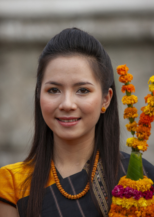 Woman during pii mai lao new year celebration, Luang Prabang province, Luang Prabang, Laos