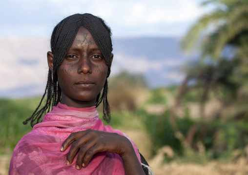 Afar tribe woman with scarifications on her face, Assaita, Afar regional state, Ethiopia