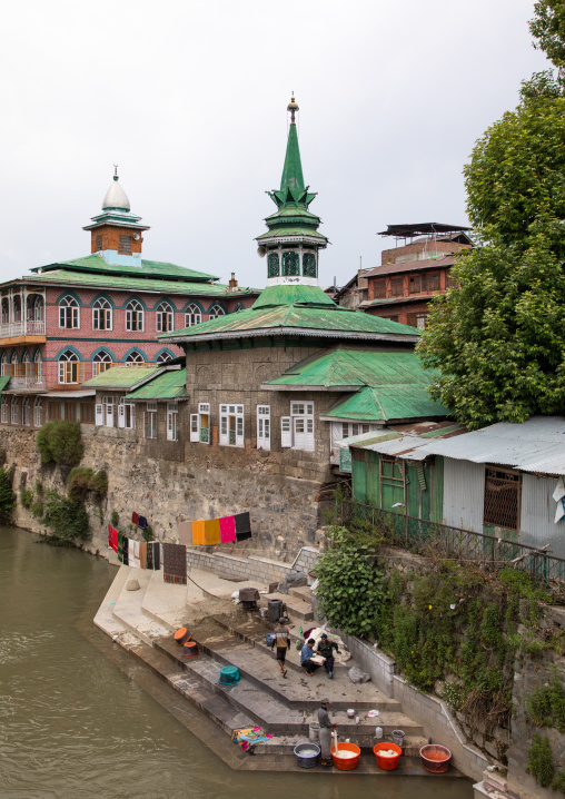 Men washing clothes on the ghat of Jhelum River, Jammu and Kashmir, Srinagar, India