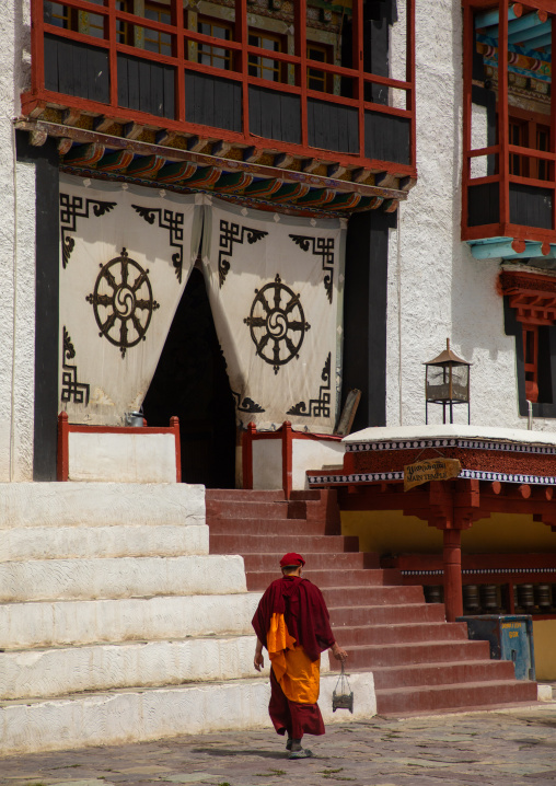 Lama carrying insence burner in Hemis monastery, Ladakh, Hemis, India