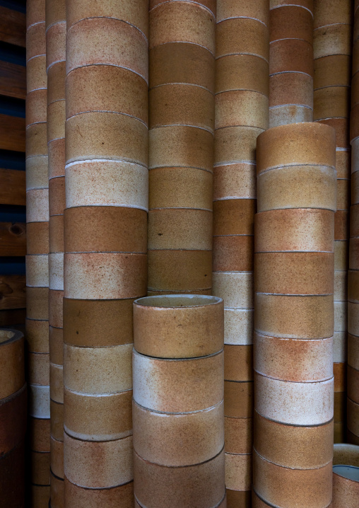 Sayas to surrend the pots in kiln at Genemongama factory, Kyushu region, Arita, Japan