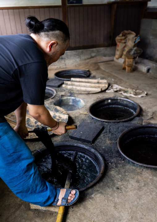 Kurume Kasuri indigo dyeing process in Aika Tanaka Kasuri Kobo workshop, Kyushu region, Chikugo, Japan