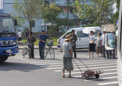 North Korean people crossing a street, DGC, Pyongyang, North Korea