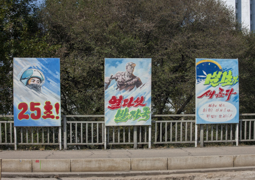 Propaganda posters in the street, DGC, Pyongyang, North Korea