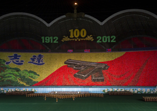 Children holding up boards during Arirang to create Kim Il Sung pistol, DGC, Pyongyang, North Korea