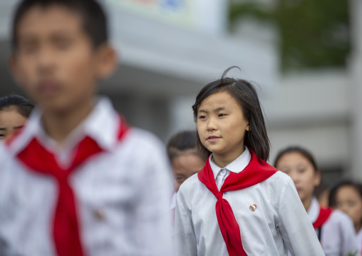 North Korean pioneers in the street, DGC, Pyongyang, North Korea