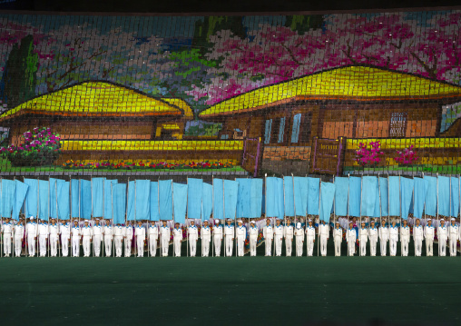 Children holding up boards during Arirang to create Kim Il Sung native house, DGC, Pyongyang, North Korea