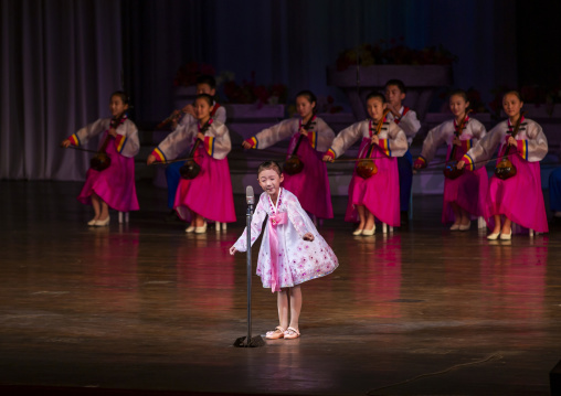 North korean girls singing during a show at Mangyongdae children's palace, DGC, Pyongyang, North Korea