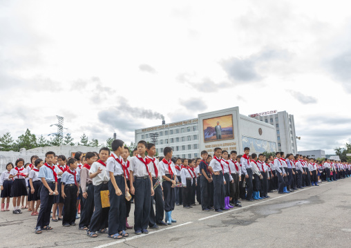 North Korean pioneers paying respect to the Leaders in Mansudae art studio, DGC, Pyongyang, North Korea