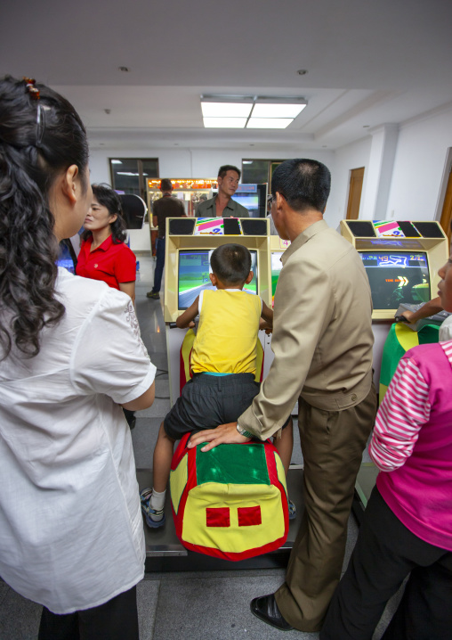 North Korean children playing video games in Kaeson youth park, DGC, Pyongyang, North Korea