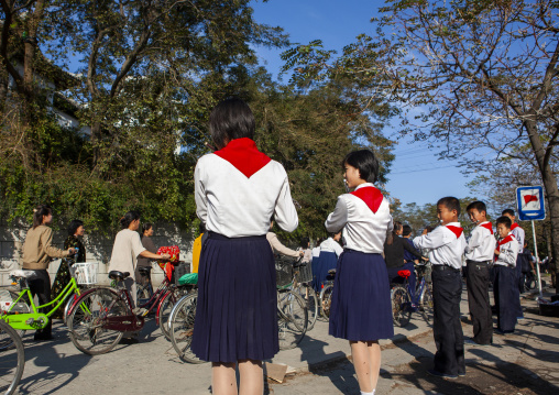 North Korean pioneers playing music in the street, Kangwon Province, Wonsan, North Korea