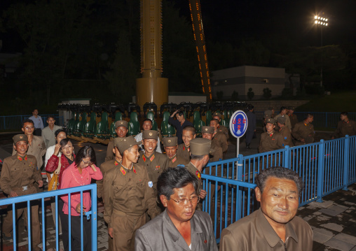 North Korean soldiers queueing in a park at night, DGC, Pyongyang, North Korea